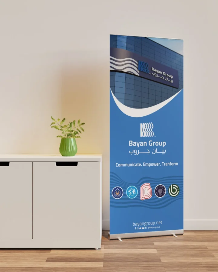 Bayan Group roll-up banner, Communicate. Empower. Transform.