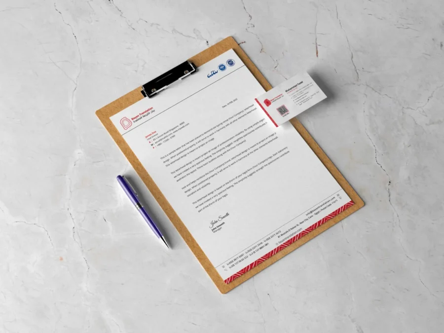 Bayan Translation letterhead and business card on a clipboard